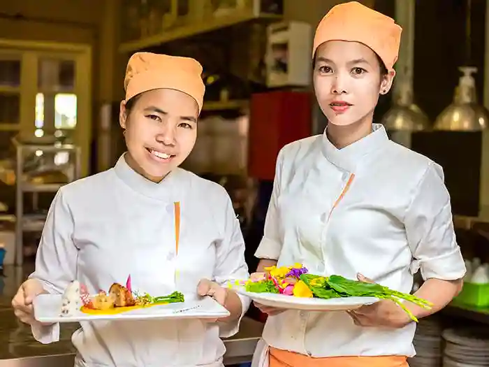 Kimsan sister chefs at Embassy restaurant in Siem Reap, Cambodia