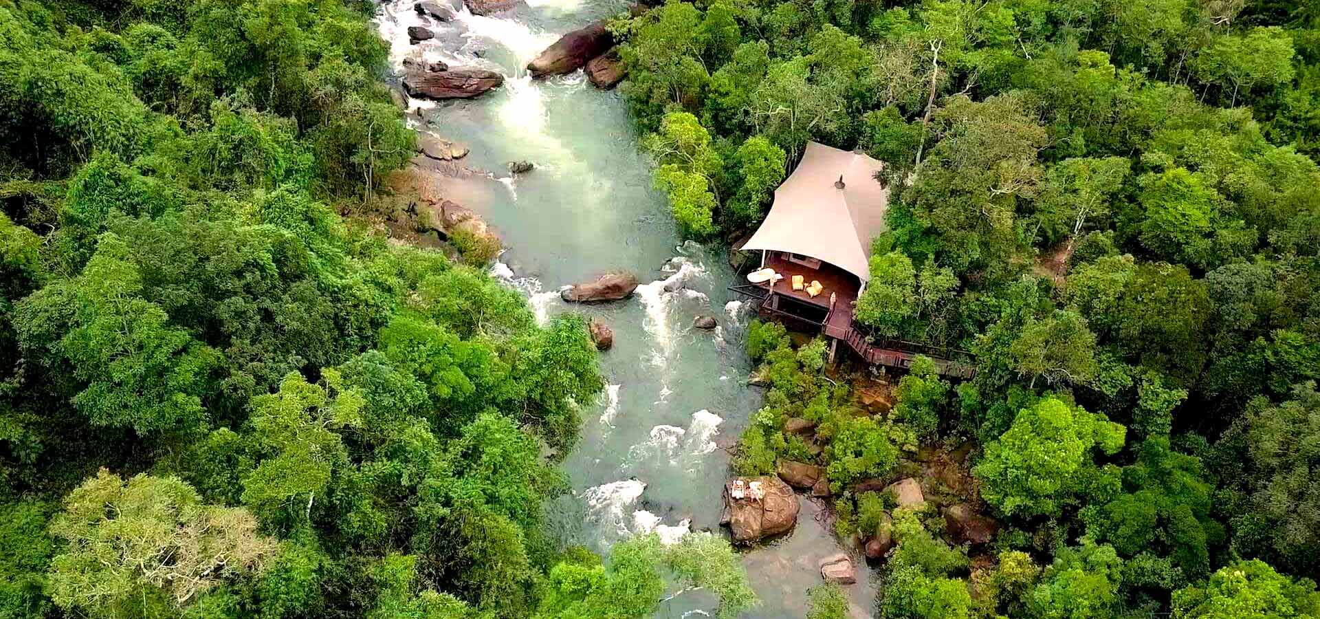 Aerial view Shinta Mani Wild Luxury Tented Camp and river