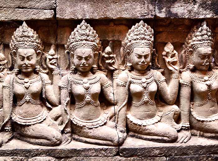 Carved stone apsaras in temple of Angkor Thom, Cambodia