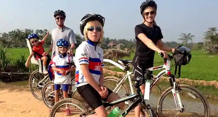 Family cycling in Angkor, Cambodia