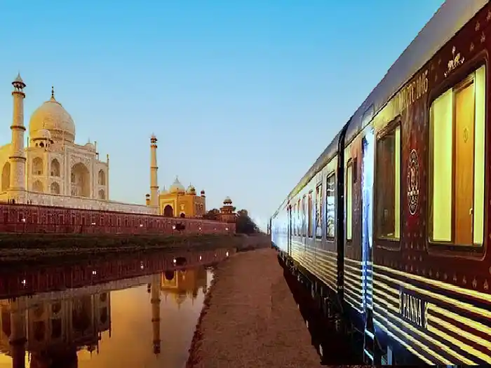 Maharajas Express luxury train passing the Taj Mahal