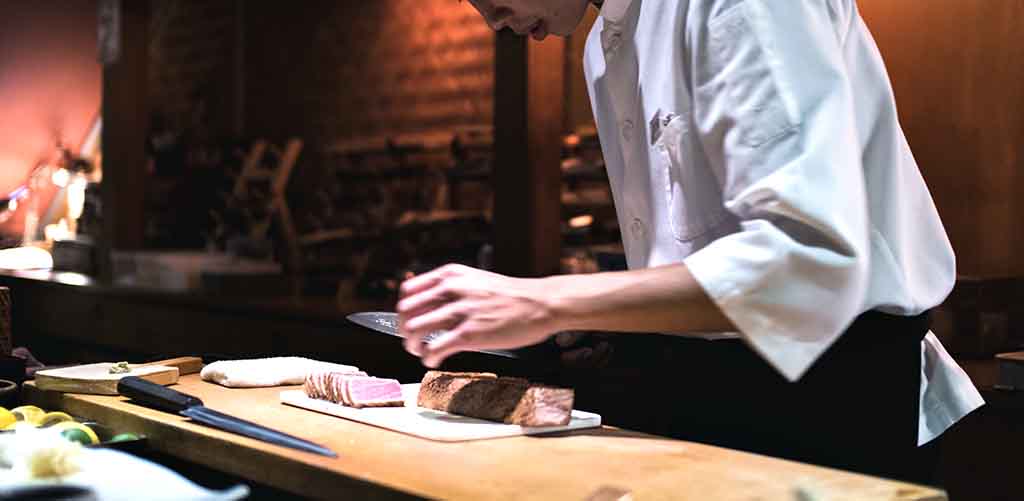 Chef preparing Kobe beef in Tokyo, Japan