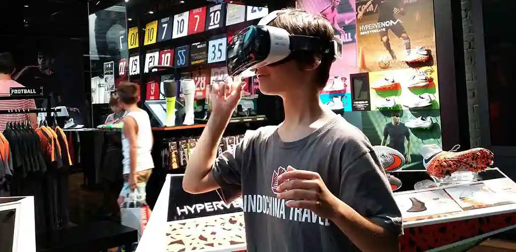 Boy trying VR goggles in Tokyo Nike store