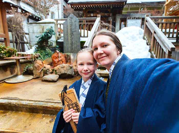 Mother and daughter on family tour in Japan