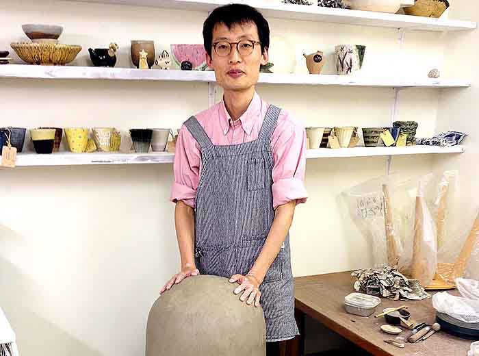 Japanese pottery make in his shop