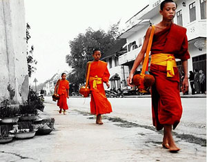 Art photograph of monks walking in Luang Prabang, Laos