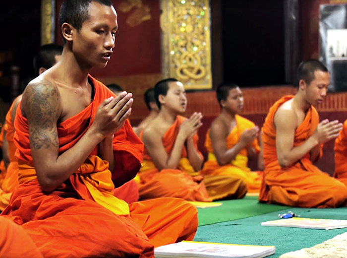 Monks meditating in Laos