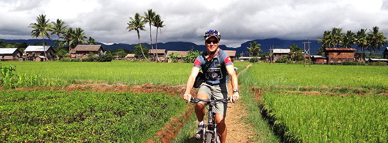 Cycling through rice fields on Inle Lake, Myanmar