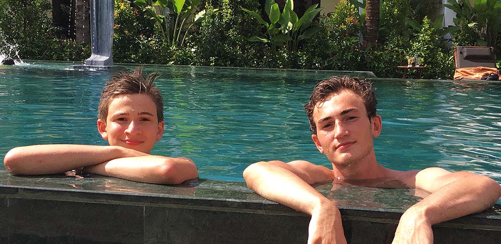 Boys in pool during Vietnam trip