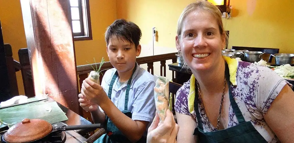 Learning make spring rolls in Hoi An, Vietnam cooking class