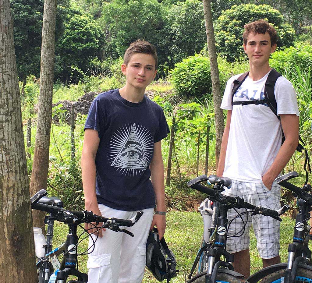 Boys on a family bicycle tour in Mai Chau, Vietnam