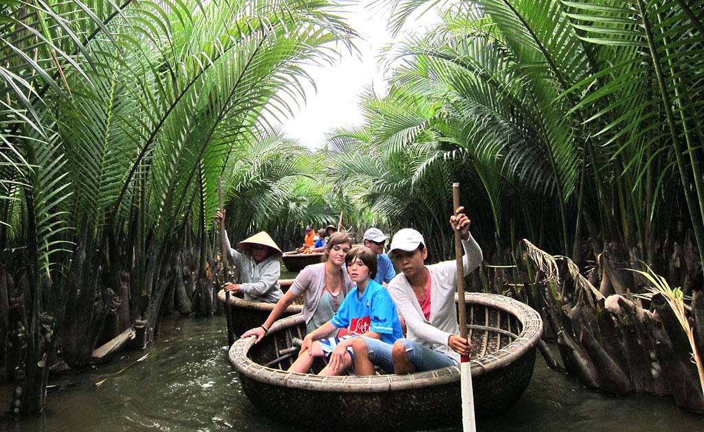 Bamboo boat ride during Vietnam family tour