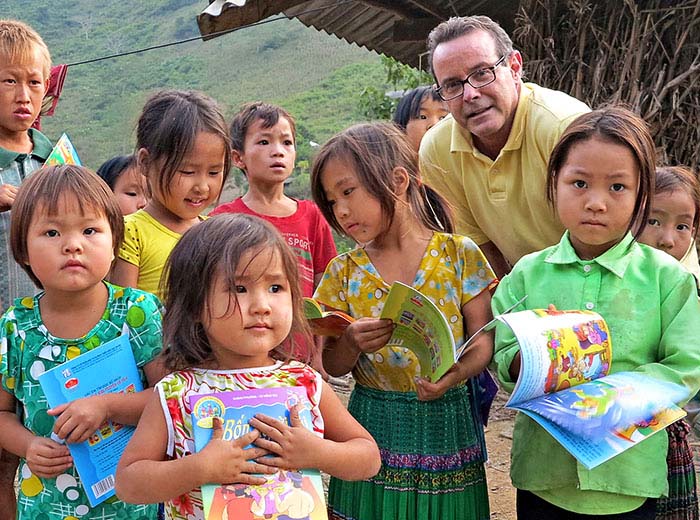 Donating books in rural Vietnam village