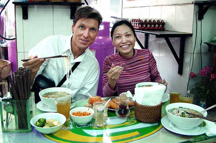 Patrick Morris eating Pho in Hanoi, Vietnam